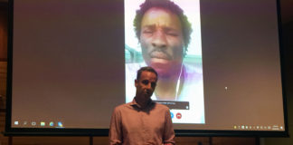 Senator Nick McKim & Abdul Aziz Adamn speaking live on Skype, Photo taken by Mary Hakimi_2