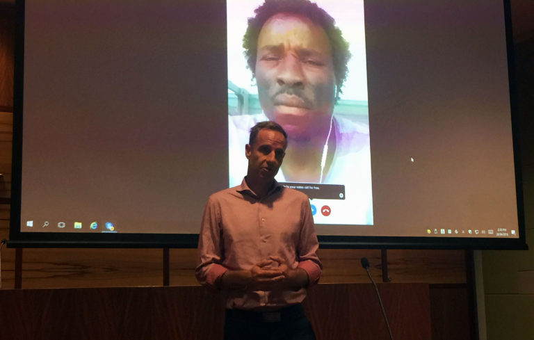 Senator Nick McKim & Abdul Aziz Adamn speaking live on Skype, Photo taken by Mary Hakimi_2