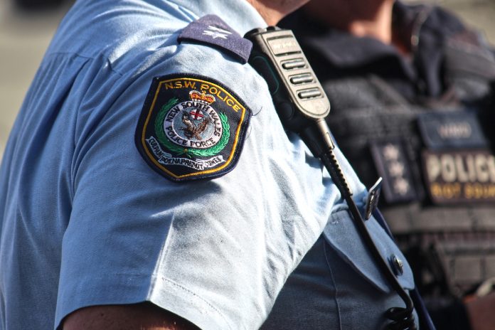 Police officers at a climate change rally