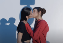 Two females kissing
